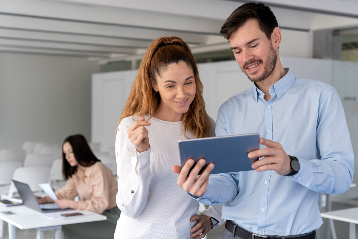 Young Business People Office Working With Tablet